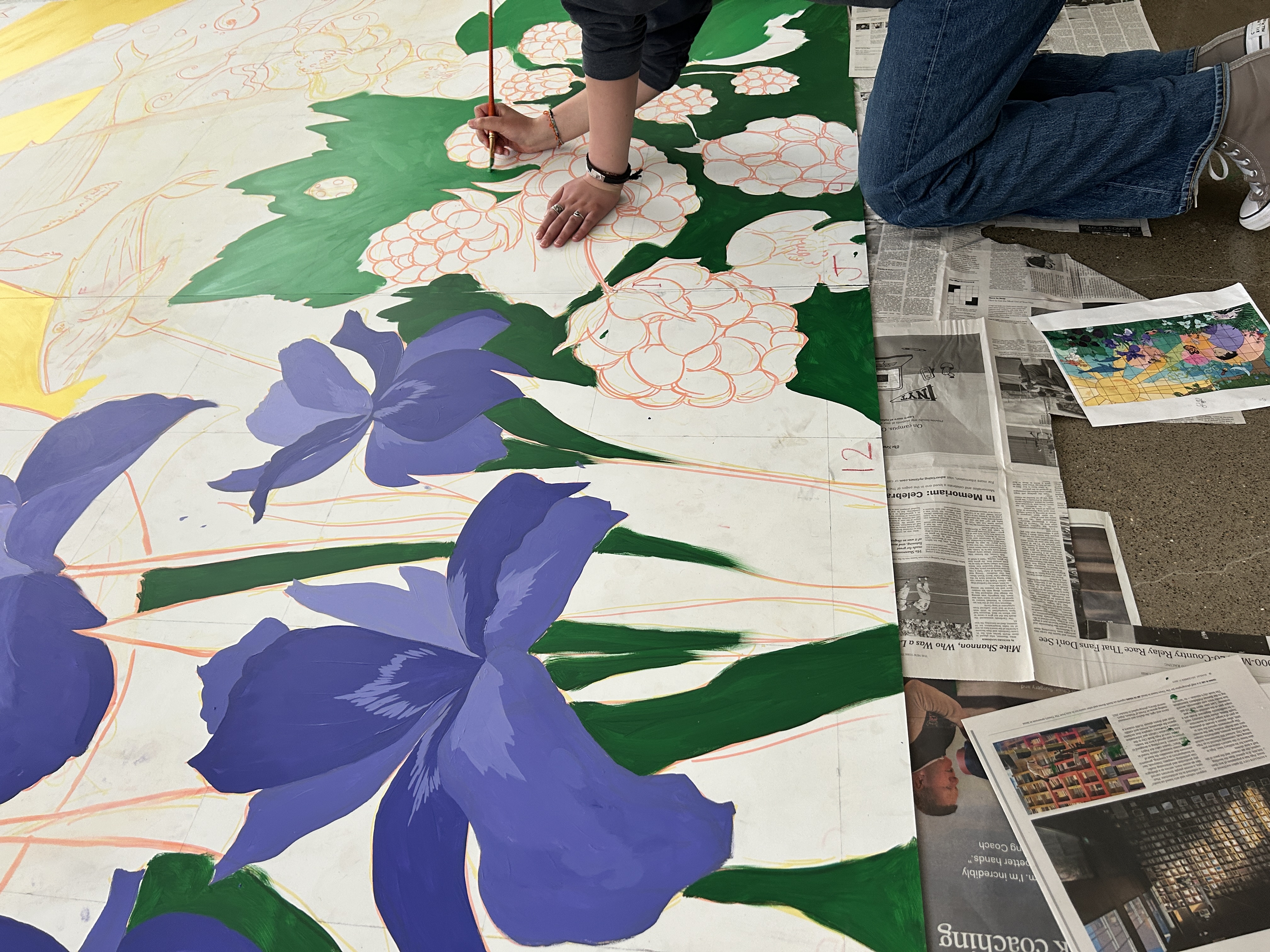 Wide view of mural in progress