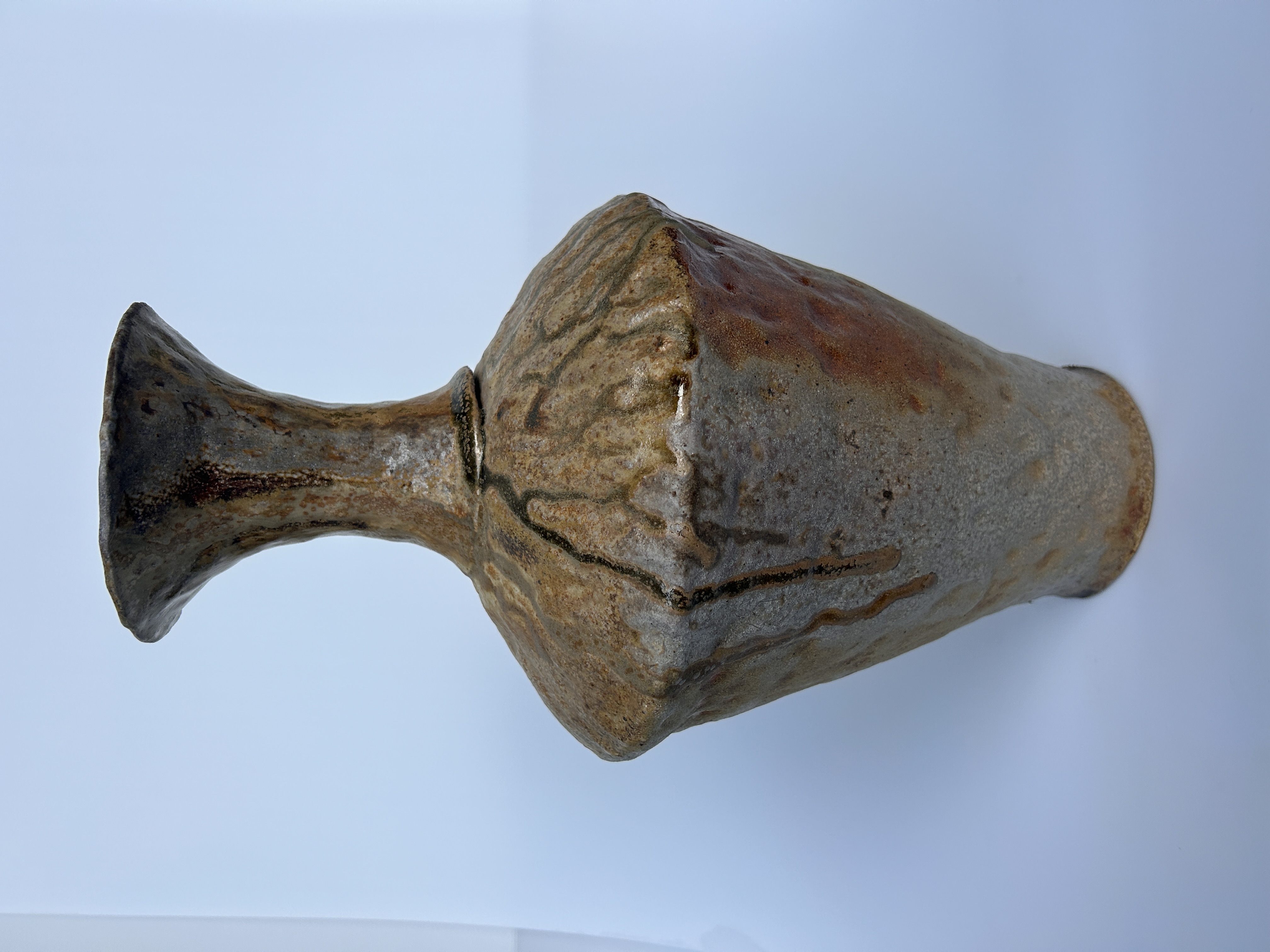 Sculptural hand-built form with natural glaze