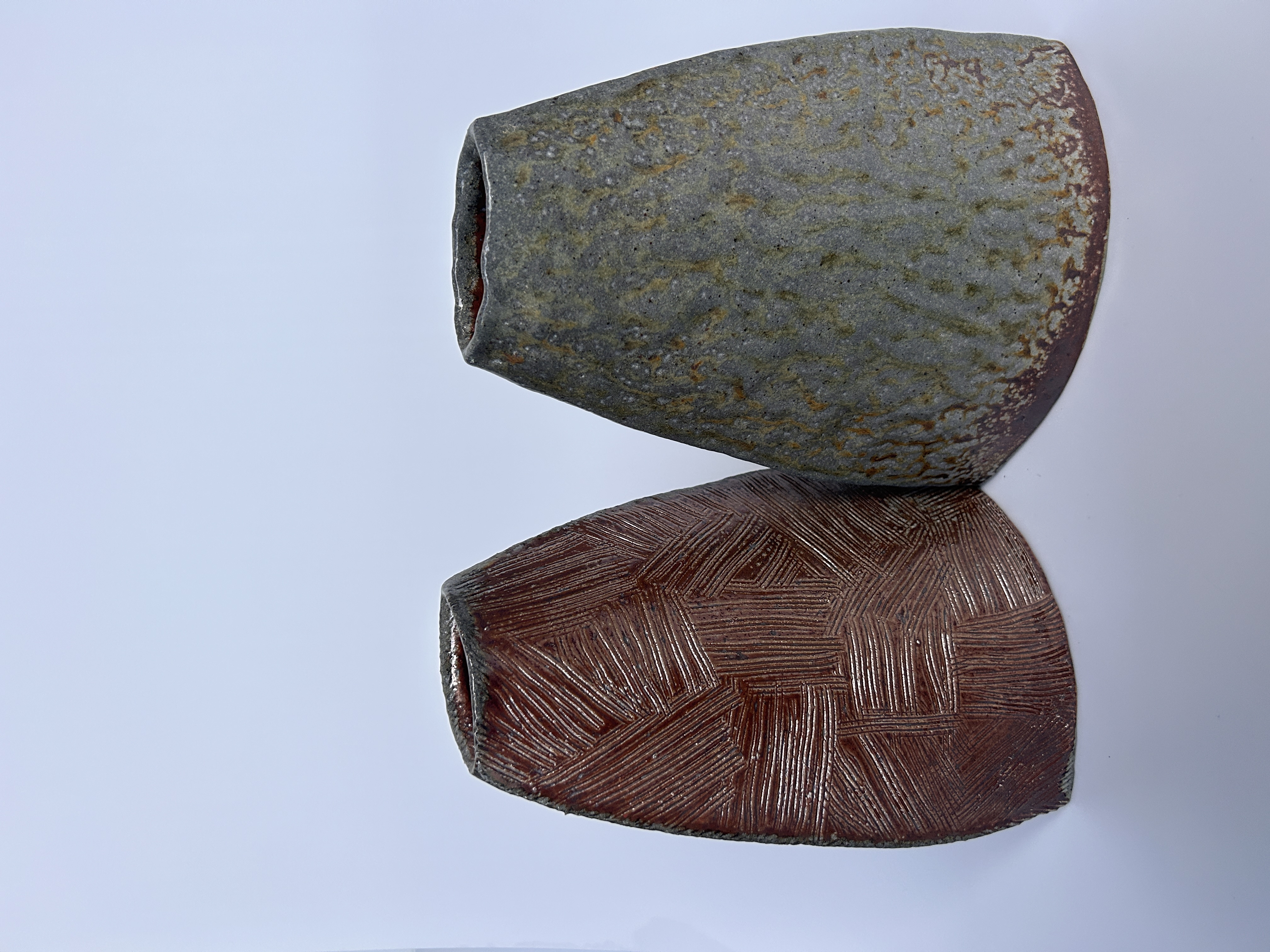 Carved ceramic beads with cross-hatch pattern